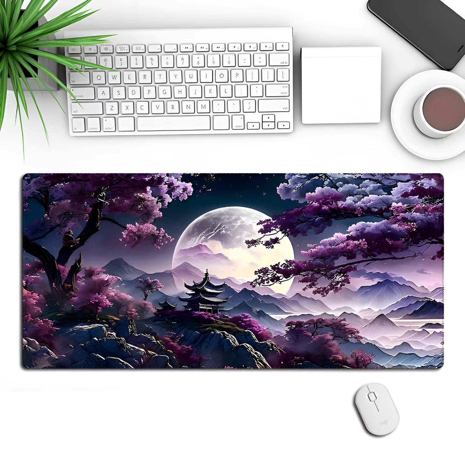 Large black gaming mouse pad with pattern design measuring 400x900mm on desk