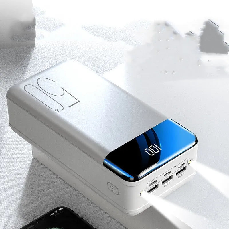 Black or white 50000 mAh power bank with three output ports measuring 169 x 83 x 52 mm