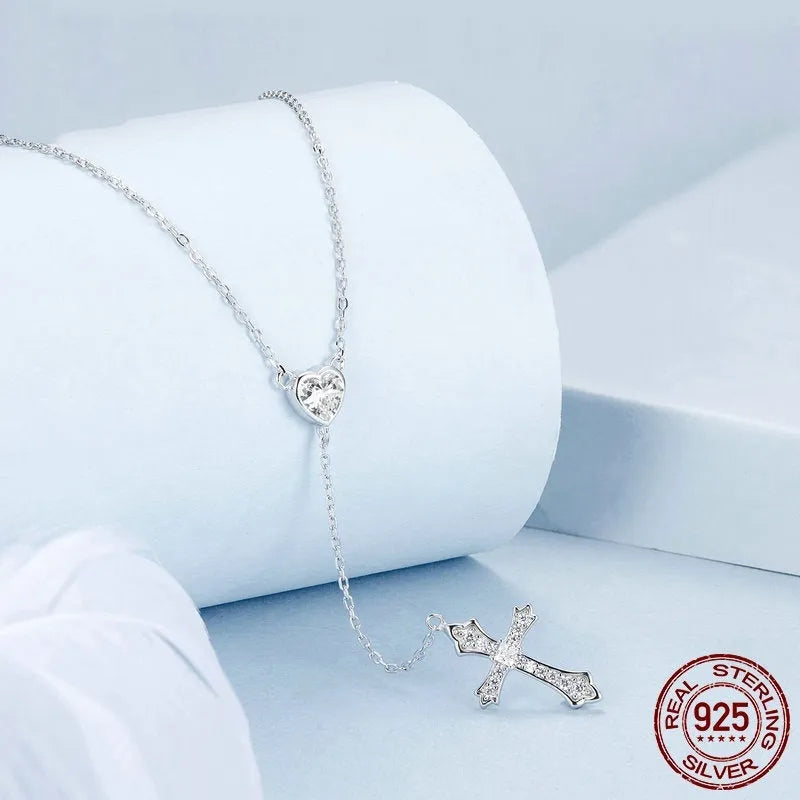 Silver necklace with V-neck cross pendant on O-ring chain in colour BSN384