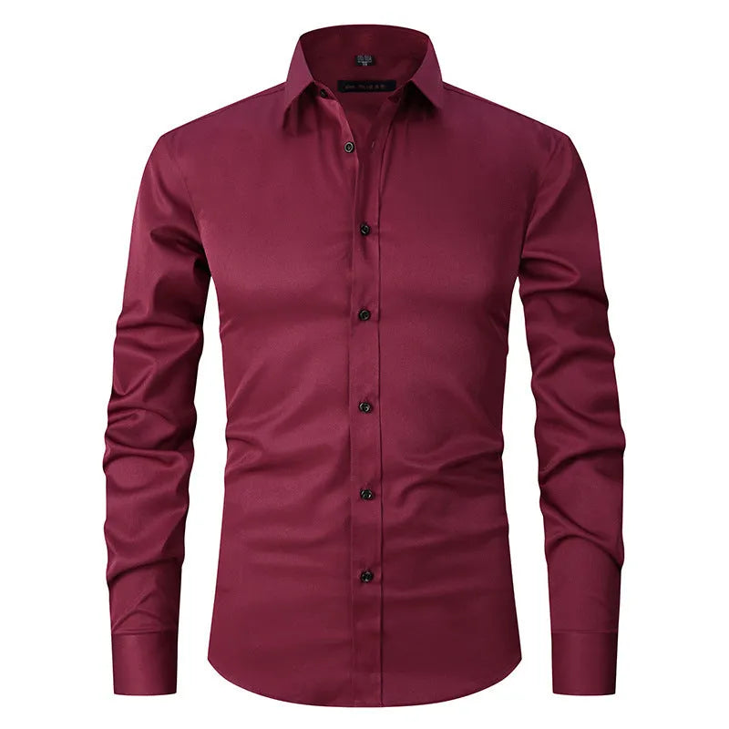 Man wearing a stretch long sleeve polyester work shirt in a solid colour.