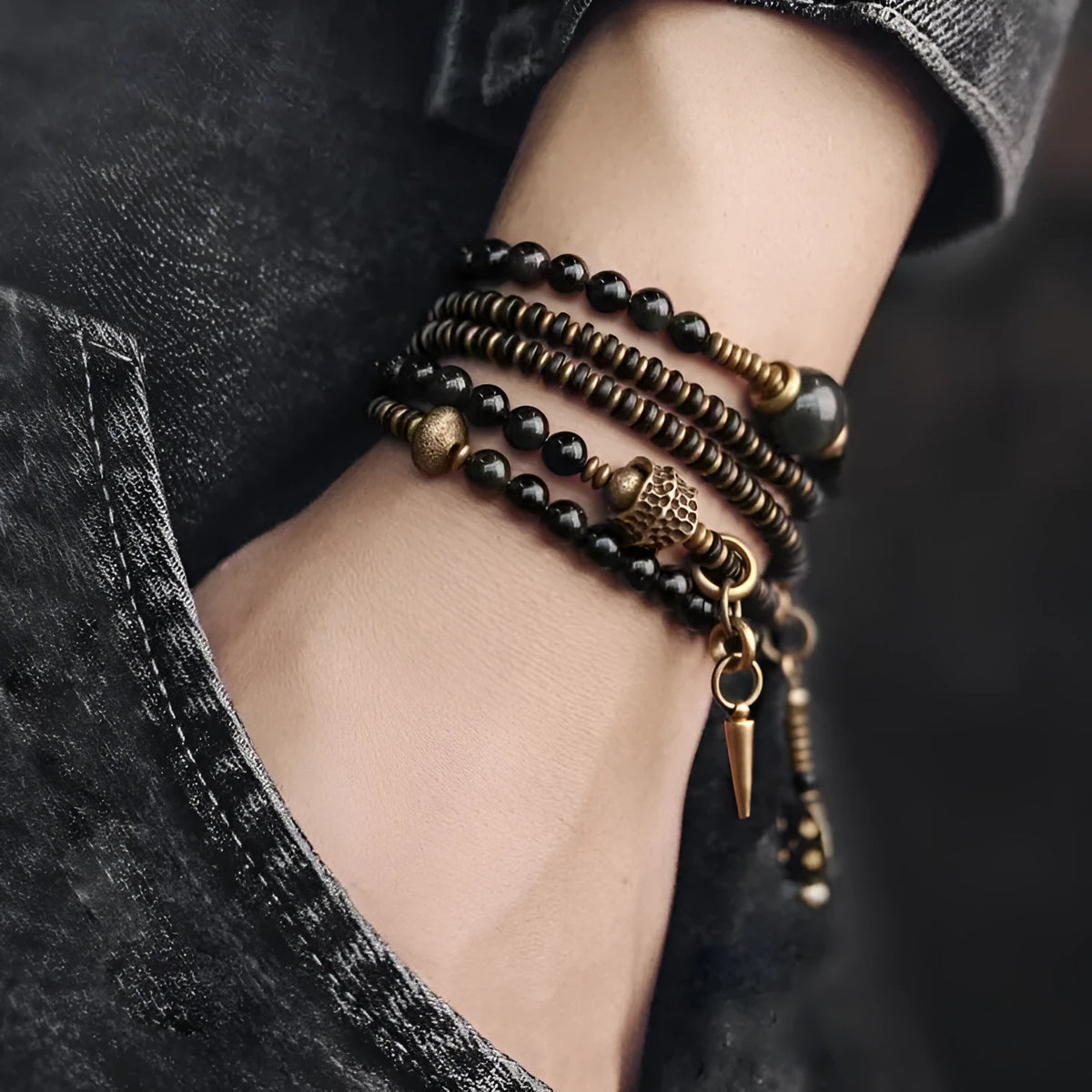 Black geometric beaded bracelet with colourful multi-layered retro design and adjustable cord