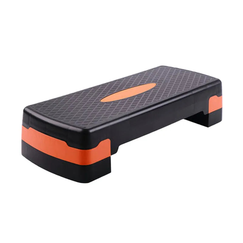 A grey ABS plastic step aerobics platform for fitness workouts, showing its size and textured surface.