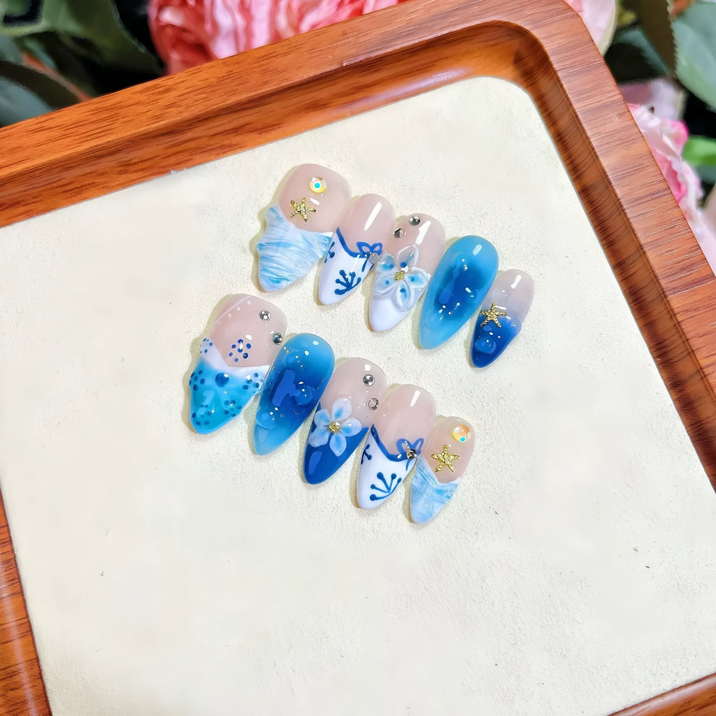 Blue hand-painted carved transparent ice fake nails in plastic material for women