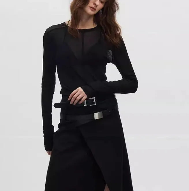 Black mesh see-through slim-fit long sleeve pullover top with round collar on a mannequin.