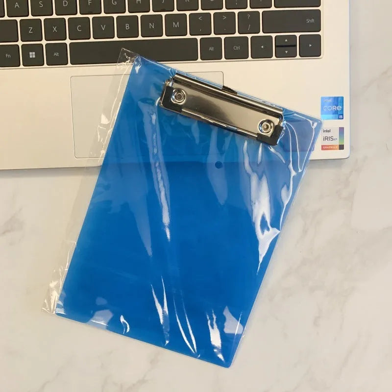 Transparent A4 plate writing board pad with a silver metal flat clip, shown in a blue colour option.