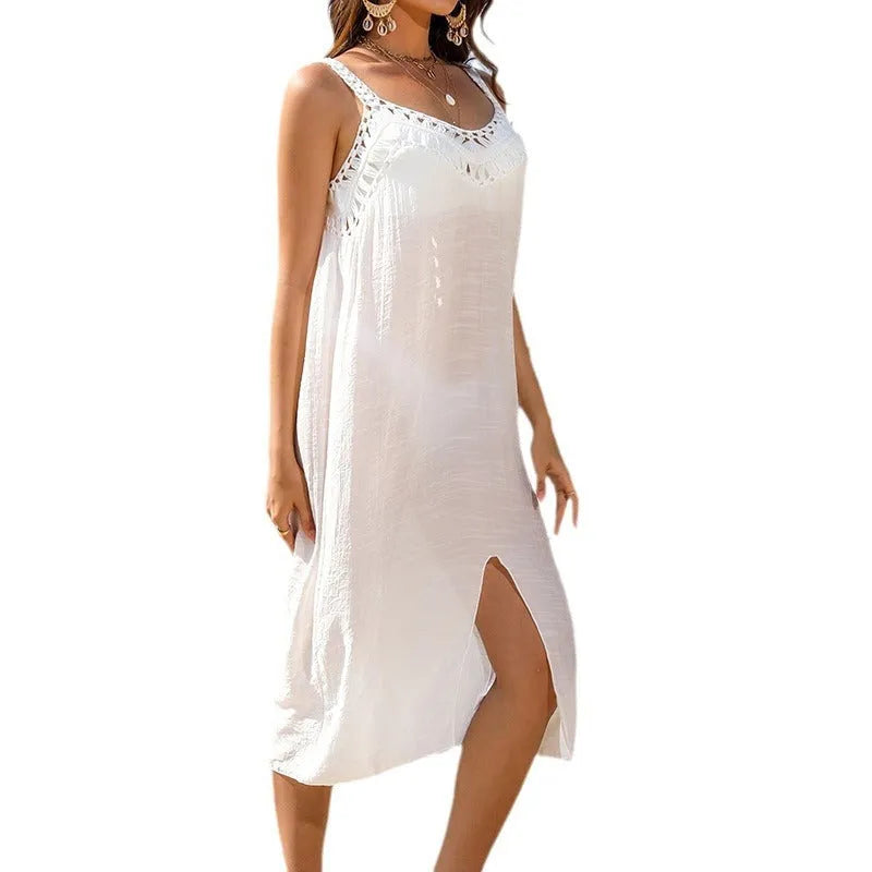 White crochet beach dress with hollow weaving pattern and bottom slit design
