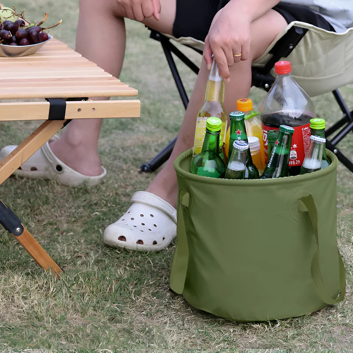 Army Green outdoor folding telescopic duct made from PVC mesh cloth, shown in a collapsed state