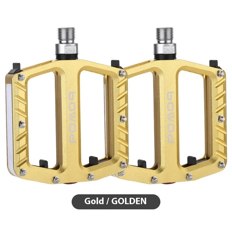 Aluminium alloy bicycle pedals with 710LED lights in black, gold, purple, red, and titanium colour options
