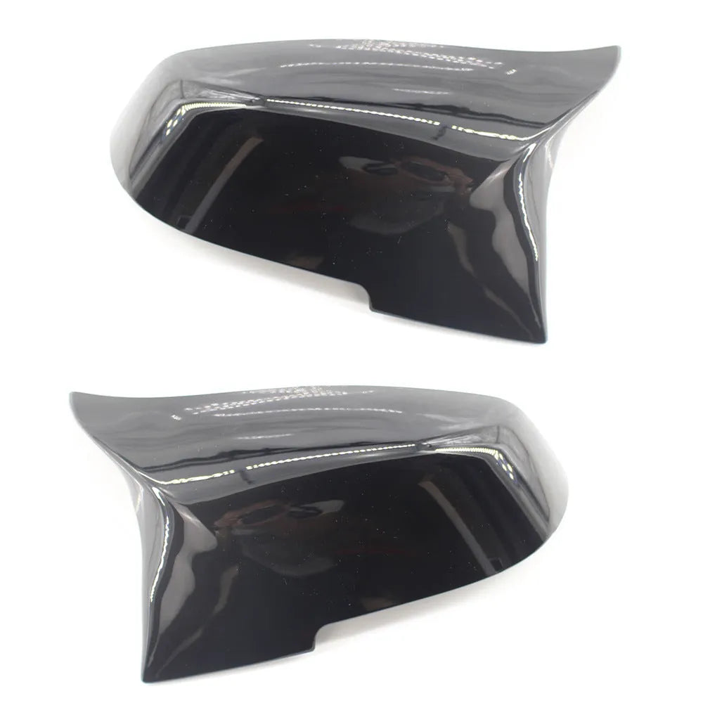 Pair of dark bright paint bright black modified horn rear-view mirror shells for BMW 3 Series and 4 Series.