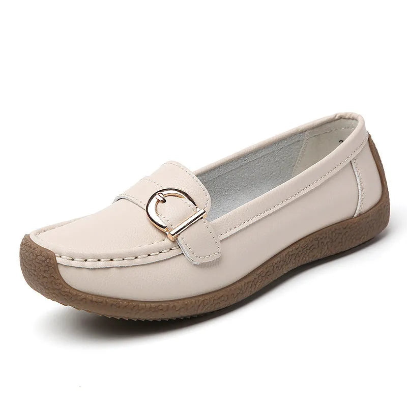 Women's casual loafers in artificial PU leather with round toe and beef tendon sole.