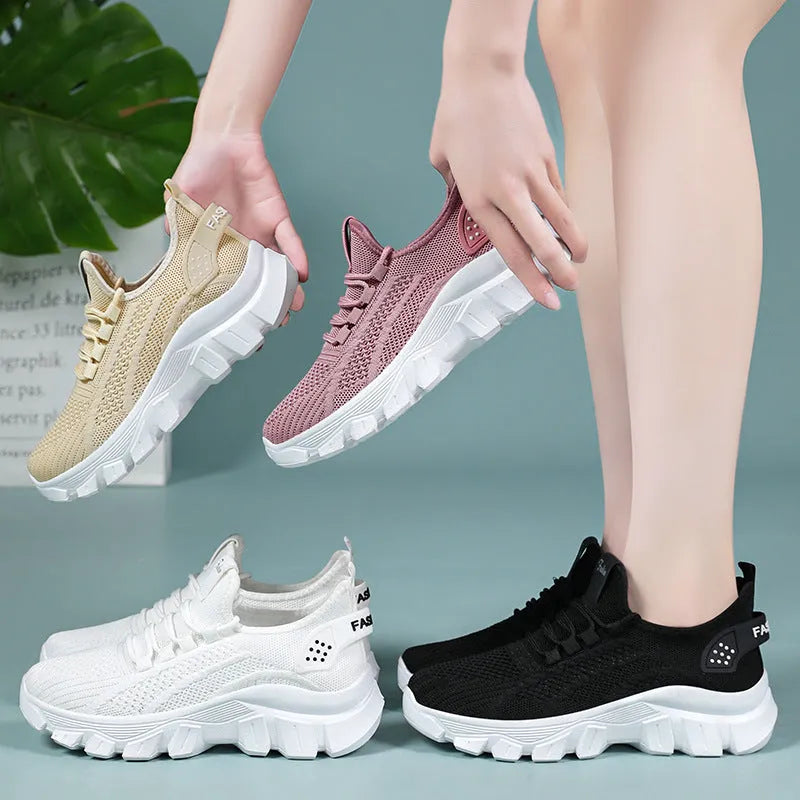 Women's white sneaker with thick PVC sole and breathable flyknit upper