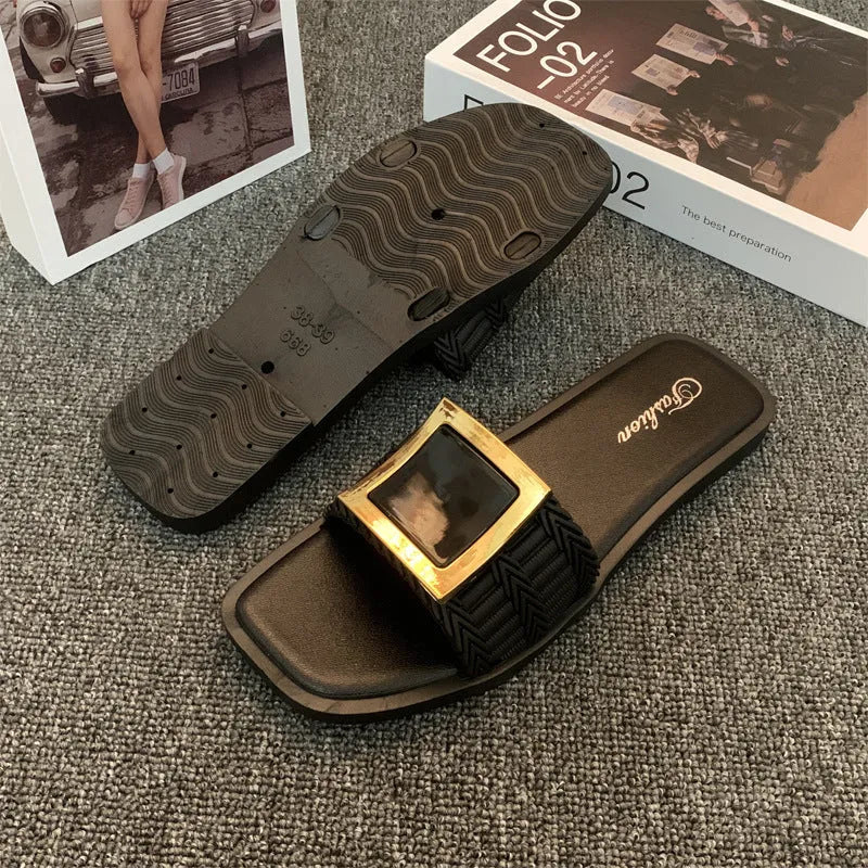 Women's apricot, black, and khaki flat summer slippers with a PVC sole.