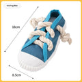 Plastic slipper-shaped dog chew toy in yellow, black, or blue colours for dental cleaning and play
