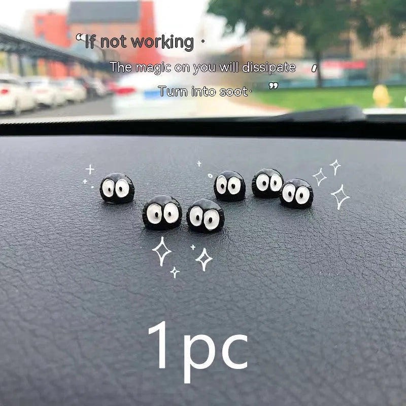 Small black resin briquette car dashboard decoration with cartoon coal ball design