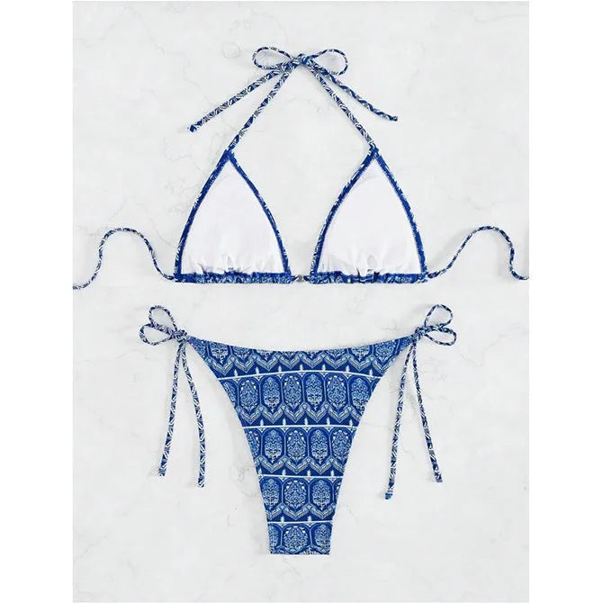 Women's green bandage style bikini with printed stitching on a briefs bottom.
