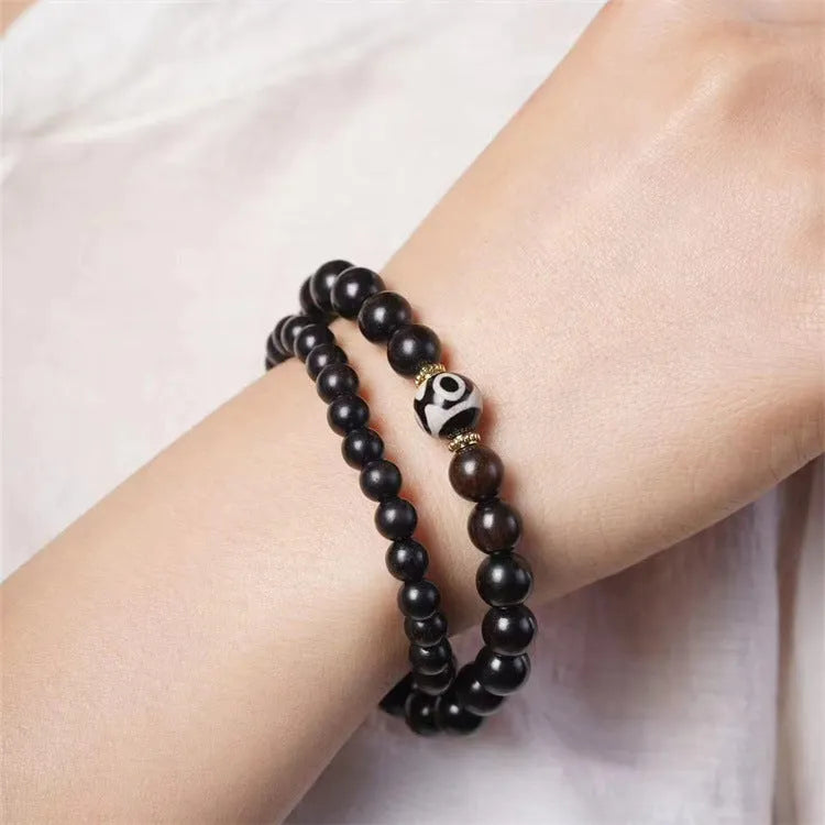Ebony Tibetan bead bracelet with two circles of 8mm dark wood beads