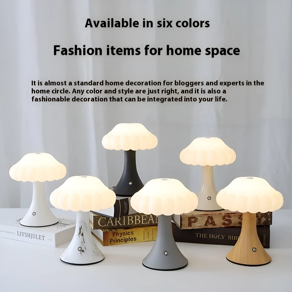 Mushroom-shaped charging touch night light in five colour options on wooden table