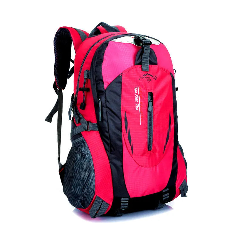 Large outdoor travel backpack in Oxford cloth showing computer pocket, dual shoulder straps, and zipper opening