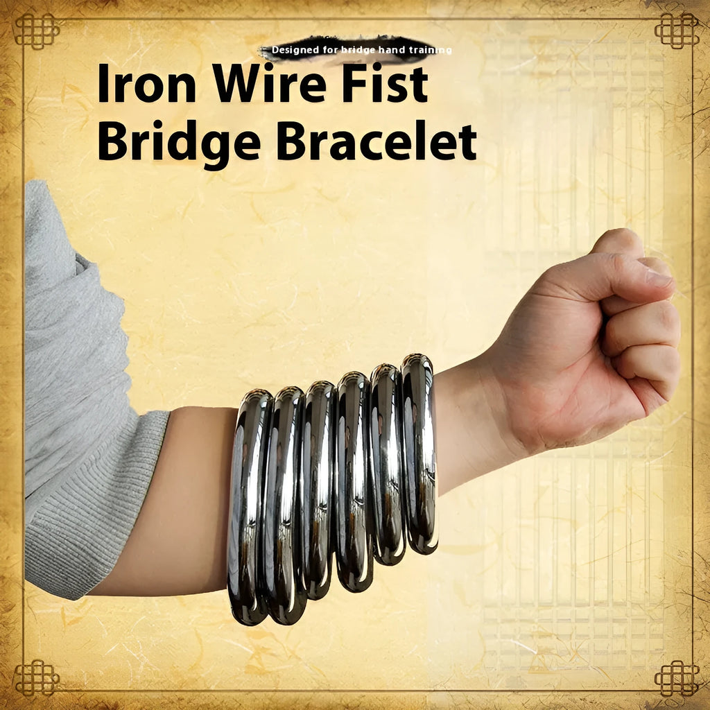 A silver-coloured carbon steel Wing Chun training ring for martial arts strength conditioning.