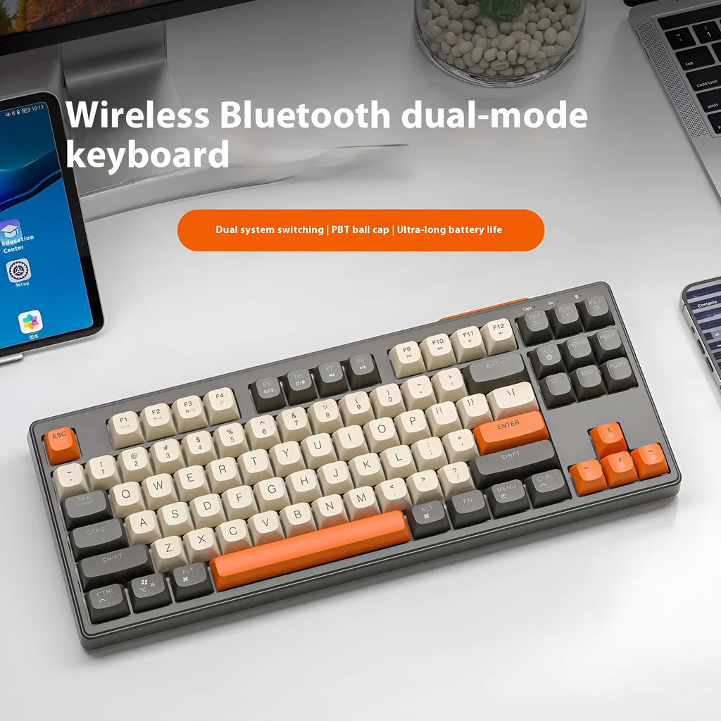 Free Wolf M87 wireless Bluetooth dual-mode mechanical feel keyboard in blueberry colour on a desk