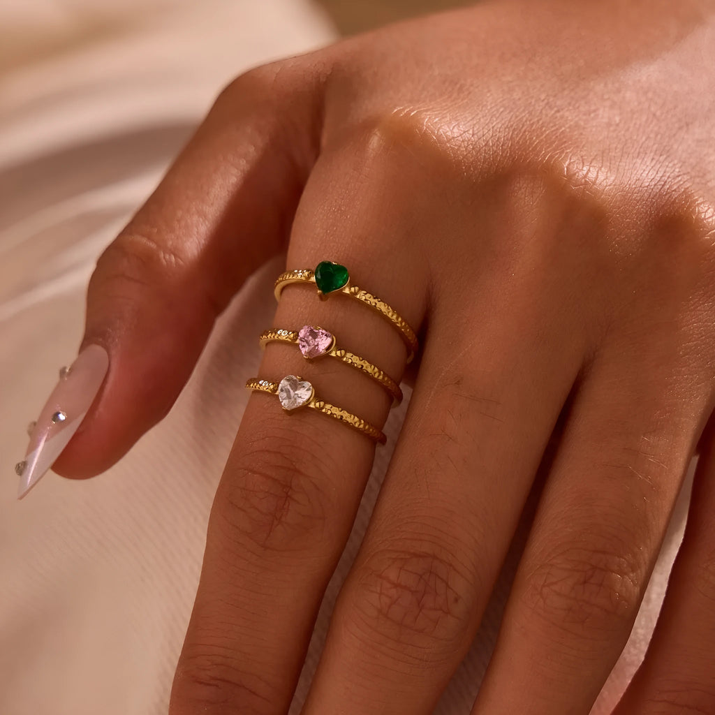 Open-ended heart-shaped ring with geometric design and zircon inlay in stainless steel