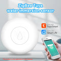 Small white Zigbee wireless water leak sensor for smart home flood detection.