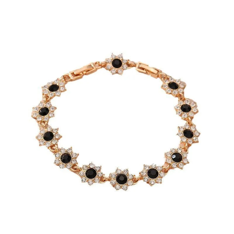 Flower charm bracelet in zinc alloy with electroplated finish and colourful crystal accents