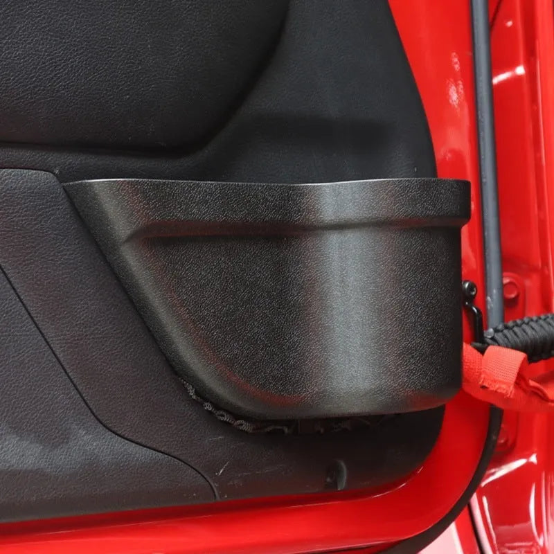 A pair of black aluminium alloy storage boxes designed for car seat back pockets.