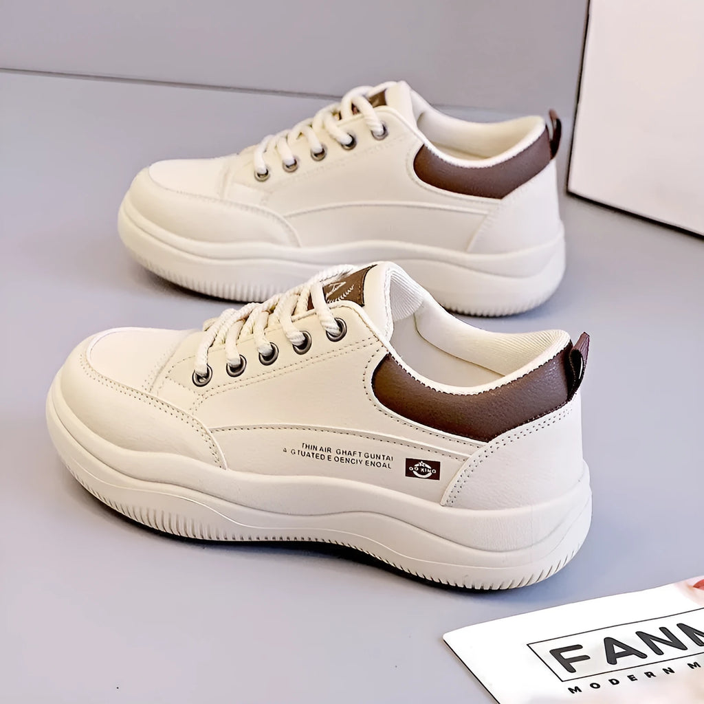 Women's white Korean-style lace-up pumps with cross straps and a round toe.