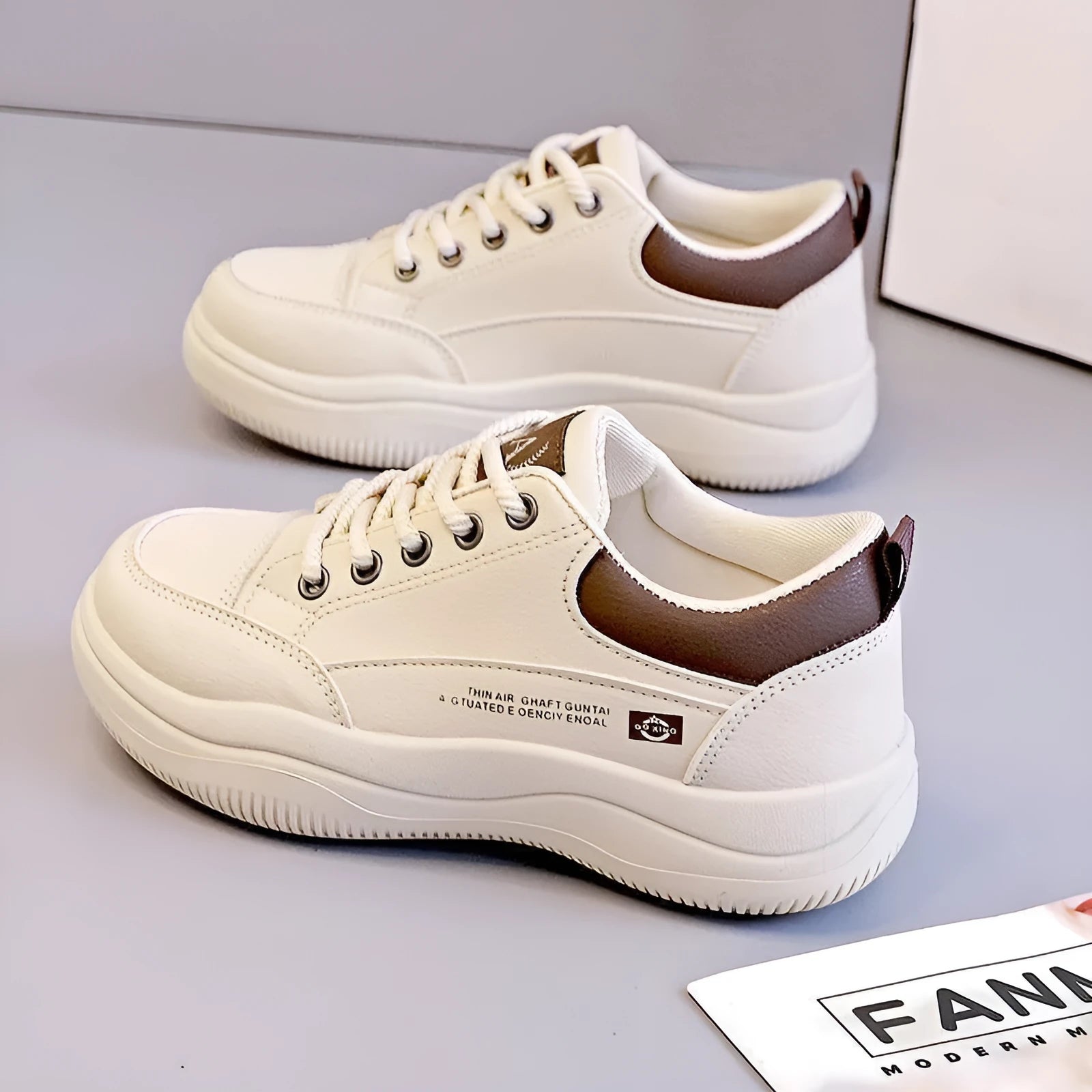 Women's white Korean-style lace-up pumps with cross straps and a round toe.