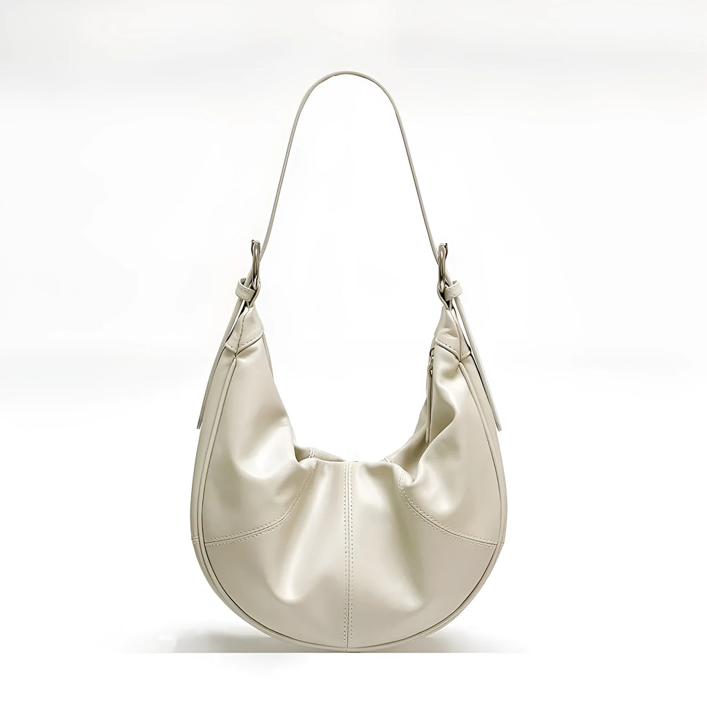 First layer cowhide shoulder bag in dumpling shape with double joint strap and sandwich pocket available in multiple colours