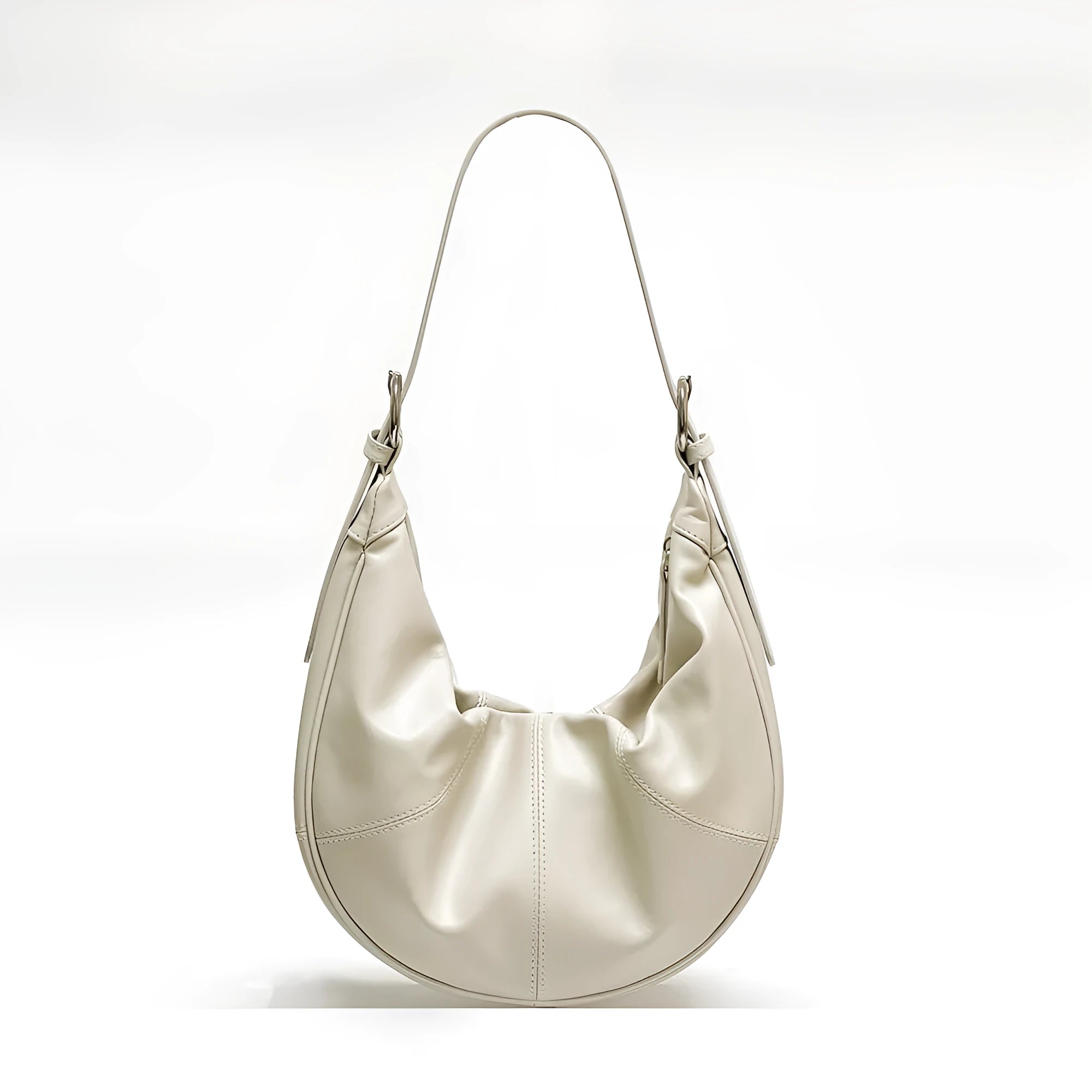 First layer cowhide shoulder bag in dumpling shape with double joint strap and sandwich pocket available in multiple colours