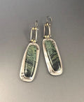 Geometric alloy earrings with two-tone marble pattern design
