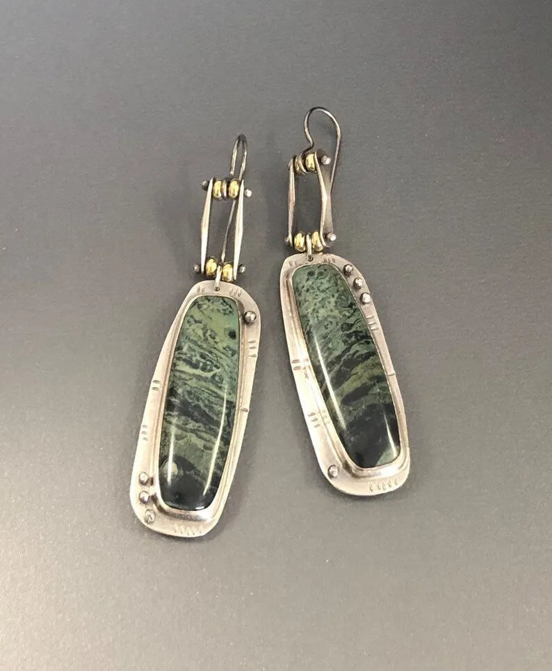 Geometric alloy earrings with two-tone marble pattern design
