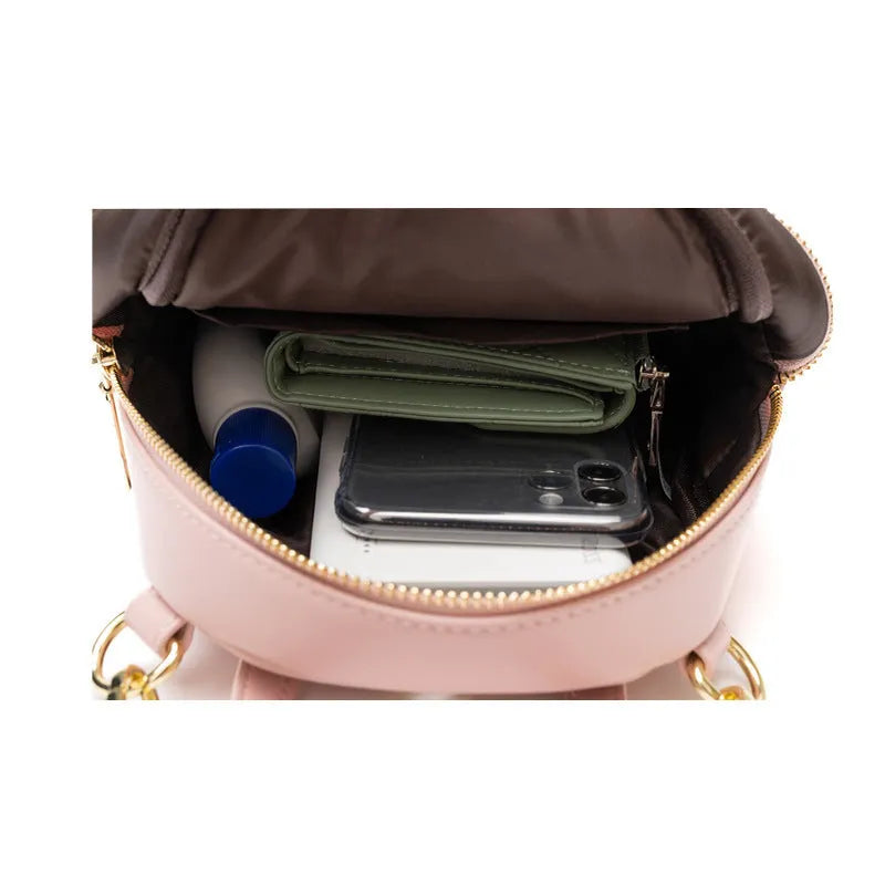Soft PU mini backpack in street trend style with three-dimensional pocket and contrast colour details
