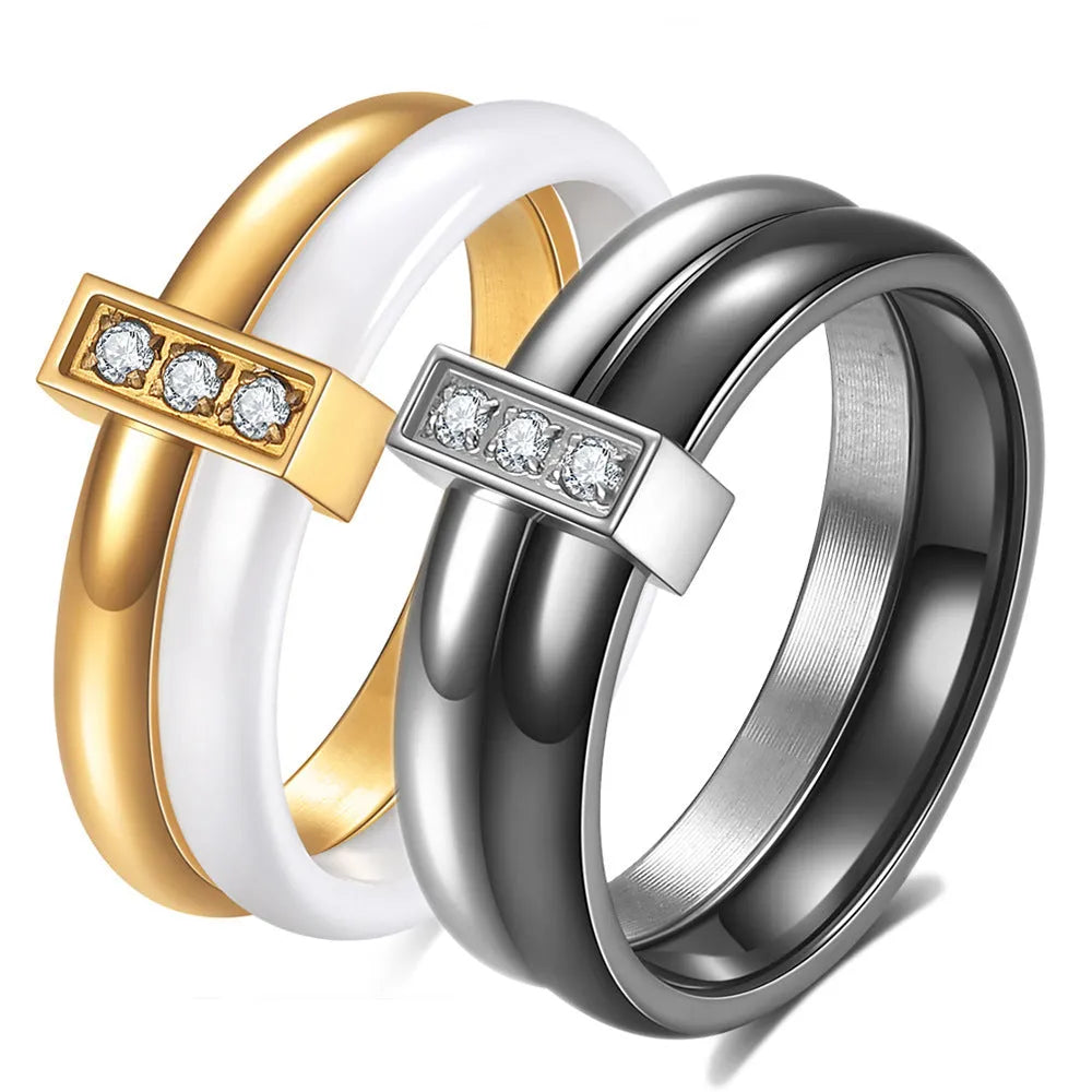 Geometric ceramic women's ring with glossy stitching and zirconium inlays in steel black finish