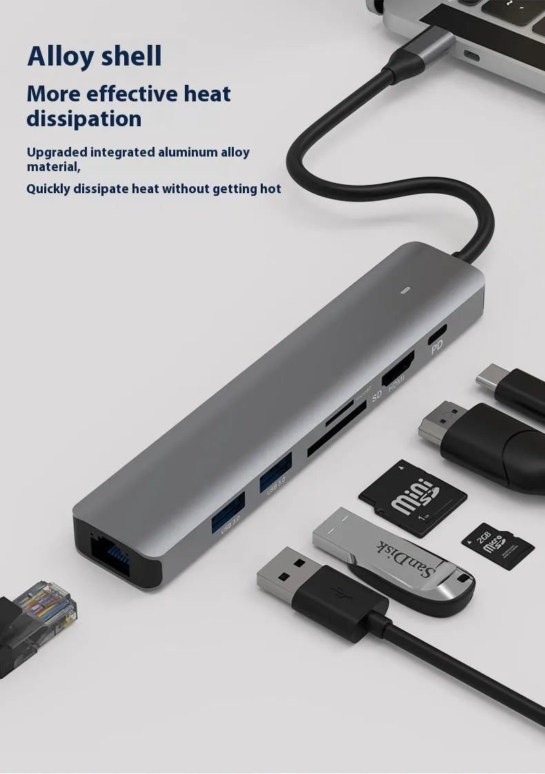 Silver LQT-LH07 7-in-1 USB-C hub and card reader for laptops showing multiple ports.