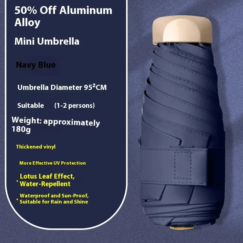 Closed five-fold manual umbrella with a gradient vinyl sunshade, showing the six-alloy-bone frame and one of eight colour options.