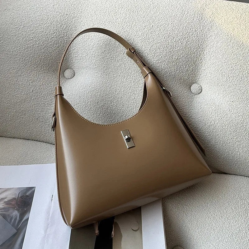 Genuine leather crossbody shoulder bag with dumpling shape and sandwich pocket design