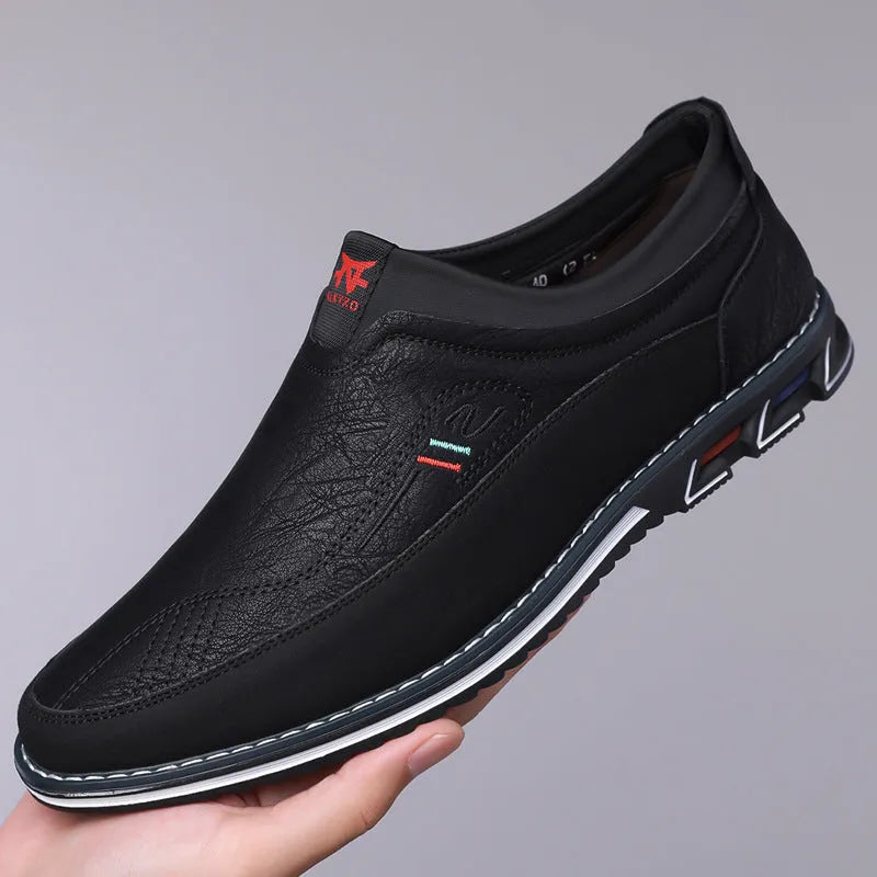 Men's leather casual shoes in black, grey, khaki, or orange with rubber sole and low-top design