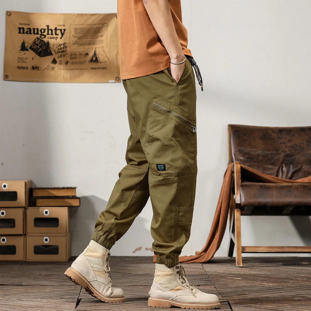 Men's American retro style tapered harem pants with ankle banded leg opening in cotton fabric