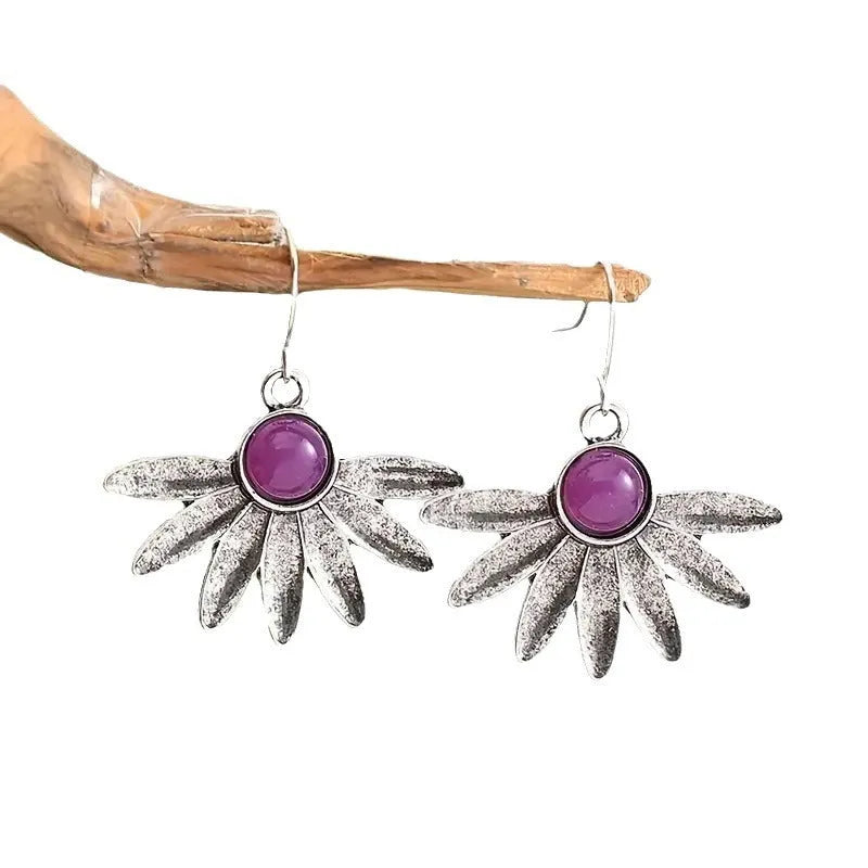 Purple Bohemian style earrings with animal zodiac design and plant flower elements