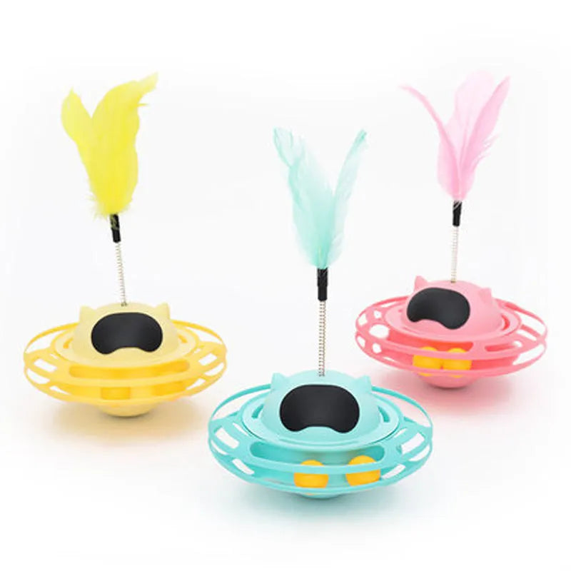 Pink cat tumble spinner toy with feather attachment measuring 17x10cm for independent feline play