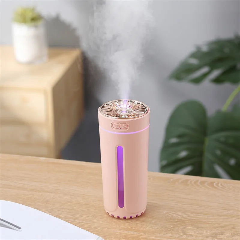 Black wireless air humidifier with colourful LED lights on a car cup holder