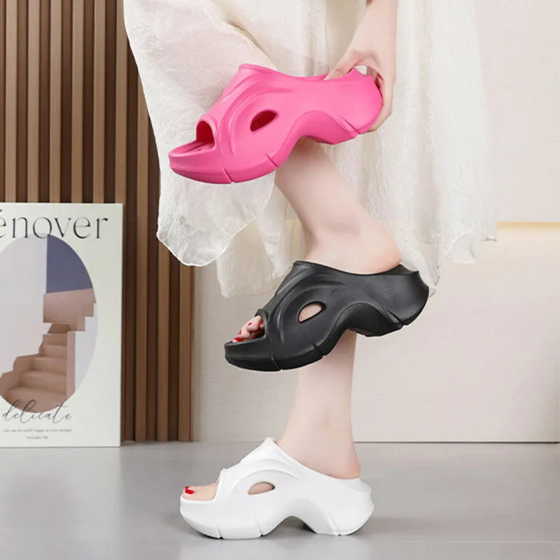 Women's white thick-soled EVA slippers with round toe design for beach use