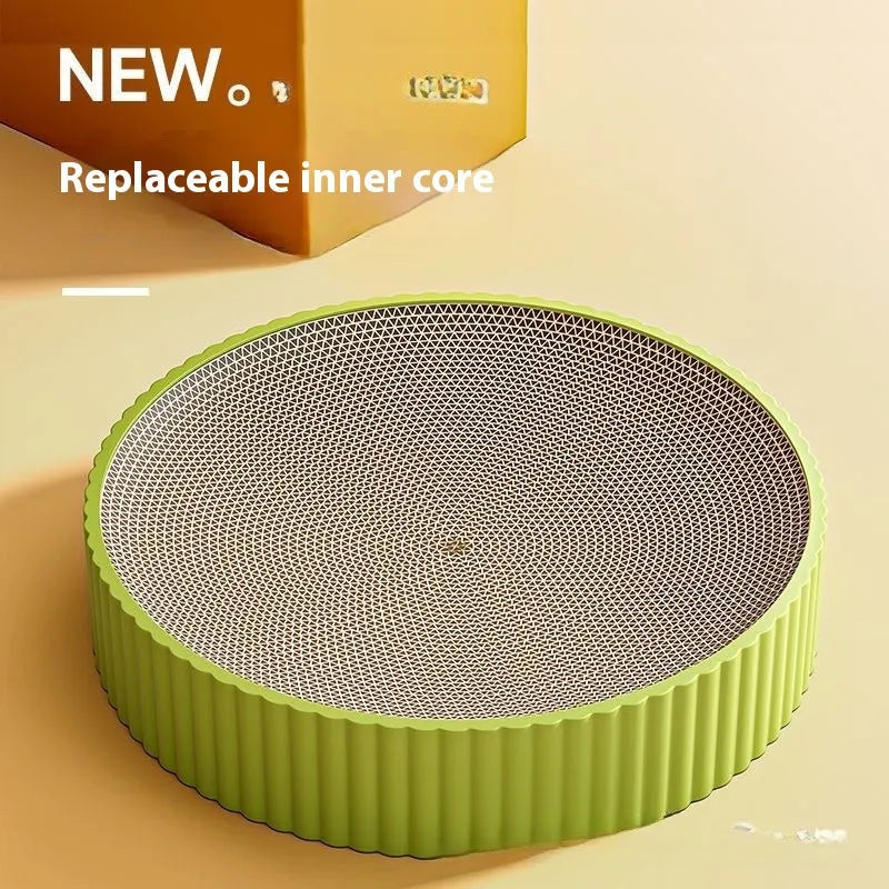Green round cat scratching board measuring 55cm with white corrugated paper surface and two replacement refills