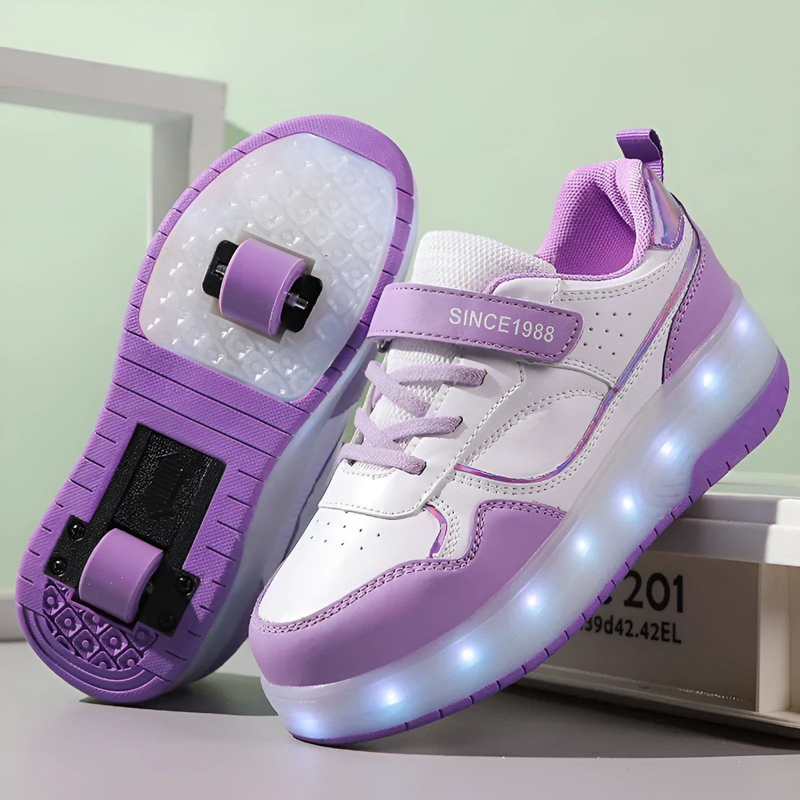 Boys and girls charging LED roller skates in multiple colours with light-up wheels