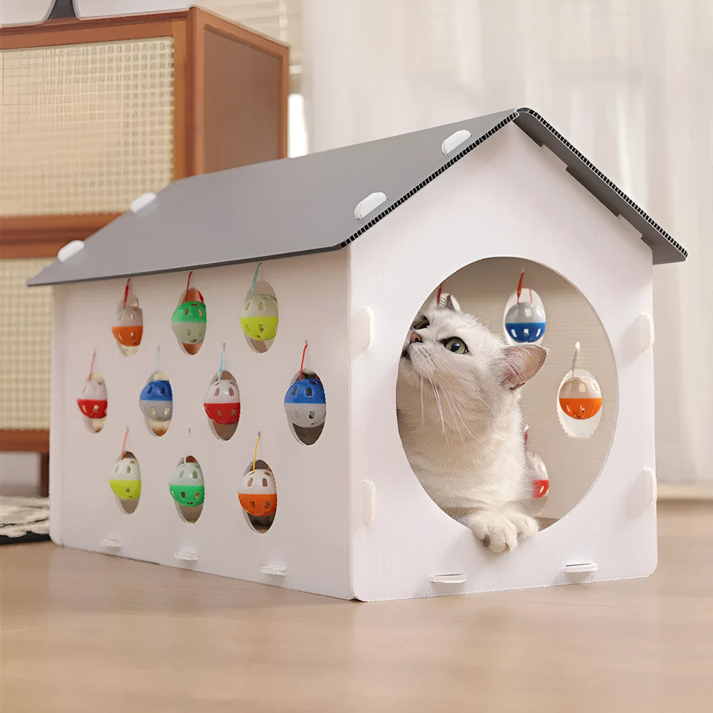 Plastic cat scratch board and bed integrated toy with a built-in tunnel containing a bell ball.