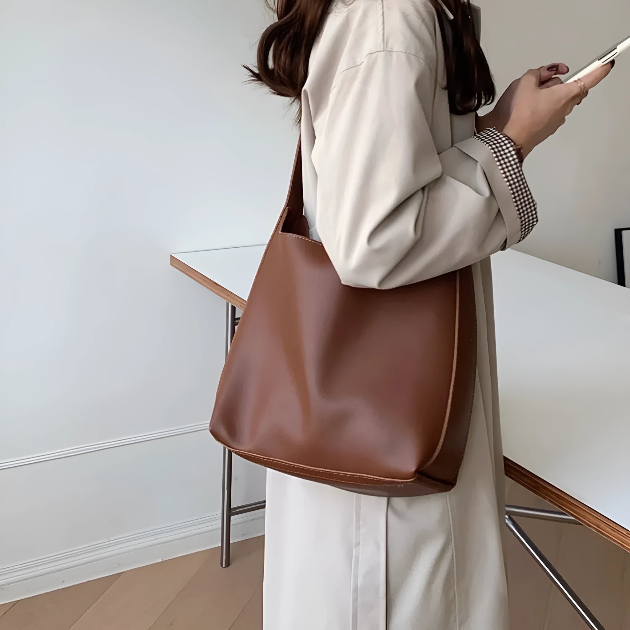 Soft PU leather ladies shoulder bag with swing threads in black or brown