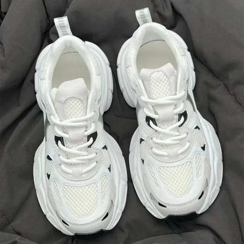 Beige Polar Wave mesh platform sports shoes with a wedge heel and lace-up front.